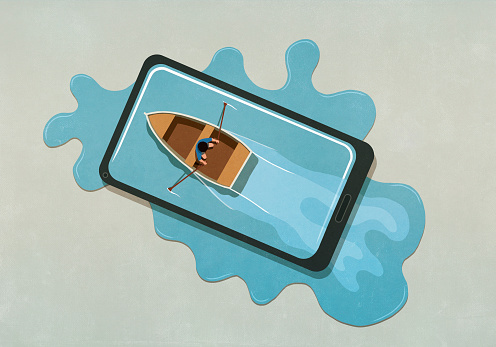 Man rowing boat in water spilling from smart phone